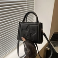 Fashionable black crossbody bag with embossed star pattern and gold hardware - Black