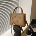 Camel small square bag featuring 3D embossed star patterns and top handle - Khaki