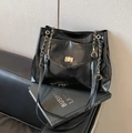 Black glossy faux leather tote bag with gold chain strap and front flap pocket - Black