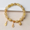 Quarz-Armband mit goldenem Kürbis-Anhänger und zylindrischen Kristallperlen - Natürliches Rutilquarz Einsträngiges Armband