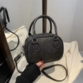 Black mini cylinder crossbody bag with lucky OHIO embossing and top handles - No Pendant / Black