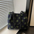 Navy wool tote bag with large green polka dots and black woven handle strap - Green Polka Dot
