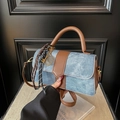 Vintage blue denim crossbody bag with brown leather trim and metal tennis racket charm - Blue