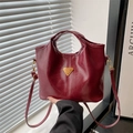 Secchiello chic in pelle cerata bordeaux con manico superiore e placca dorata - Rosso