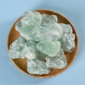 Natural green fluorite raw crystal stones displayed in a rustic wooden tray decoration - Faceted Green Fluorite (2-3cm) 100g
