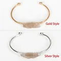 Handcrafted open cuff bracelet with natural raw crystal in gold and silver tones - Brown (Smoky Quartz) - Gold