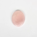 Oval pink quartz worry stone with a polished surface for energy healing massage - Rose Quartz
