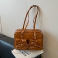 Retro brown PU leather shoulder bag with twin drawstring pockets and white stitching - Brown Pocket Version