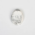 Oval white howlite thumb stone with natural grey marble veins and polished surface - Howlite