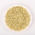 Polished citrine gravel stones in a white ceramic dish for home decor and aromatherapy - 9-12mm