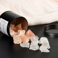Crystal fragrance stone set with Himalayan salt rocks in a black metal tin container - White Crystal And Himalayan Salt