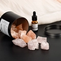 Pink crystal fragrance stone set with essential oil in a black tin container - Rose Quartz And Himalayan Salt And Essential Oil And Box