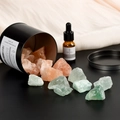 Crystal aromatherapy set with green fluorite, pink stones and essential oil in black tin - Green Fluorite And Himalayan Salt And Essential Oil And Box