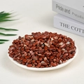 Polished natural Red Jasper stones in a ceramic plate for home decor and healing - Red Jasper