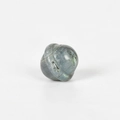 Polished labradorite gemstone carved in a Saturn planet shape with blue flashes - Labradorite