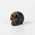 Polished natural bloodstone crystal skull carving with unique colorful mineral patterns - 1.5 Inch / African Blood Stone