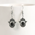 Silver Hamsa Hand hook earrings with natural black crystal bead on white cup edge - Obsidian