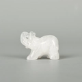 Carved white crystal elephant figurine with polished finish and natural gemstone texture - White Crystal (Small)