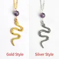 Collane con pendente a serpente con perle viola in finiture oro e argento lucido - Stile Oro / Ametista