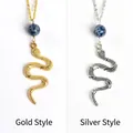 Snake pendant necklace with blue gemstone bead in gold and silver finish options - Gold Style / Blue Sodalite