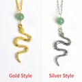 Snake pendant necklaces in gold and silver finish with green bead accents - Gold Style / Green Aventurine