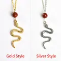 Snake pendant necklace with red bead accent in gold and silver finish options - Gold Style / Red Jasper