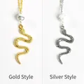 Vintage snake pendant necklace with marble stone bead in gold and silver finish - Gold Style / Howlite