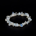 Handmade bracelet with irregular moonstone and opal crystal chips on a black background - Opalite (Synthetic)