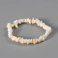 Handmade bracelet with irregular cream-white shell stones and natural mother of pearl luster - Shell Stone (Synthetic)