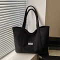 Large black corduroy tote bag with Fashion Instinct label for commute and daily use - Black