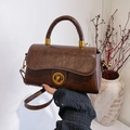 Sac à main vintage marron avec fermoir tournant doré et poignée ronde - Marron