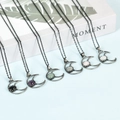 Retro crescent moon necklaces with colorful natural stone spheres in silver finish - Labradorite / Antique Silver - Cabochon Style
