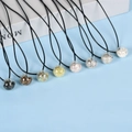Eight crystal stone moon ball necklaces with natural mineral chips in vibrant colors - Rose Quartz / Gold Round Ball Style
