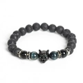 Lava stone bead bracelet featuring a black wolf head charm and blue cat eye gemstones - Blue Tiger Eye