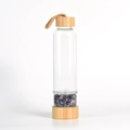 Bamboo lid glass water bottle with amethyst crystal gravel and woven carrying rope - Amethyst