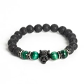 Men's volcanic stone bracelet featuring black wolf head and green tiger eye beads - Green Tiger Eye