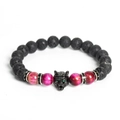 Black lava stone bracelet featuring a carved wolf head and pink tiger eye beads - Rose Red Tiger Eye