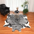 Macro shot of faux zebra hide rug texture on dark wood floor in modern living room - Zebra Large 1.60m*2.1m