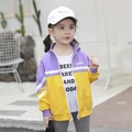 Kids color-block jacket in purple and yellow with a zip-up collar and front logo detail - 90cm / Tops / Golden / Purple