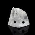 Polished black obsidian ball stud earrings displayed on natural white crystal mineral stone - White Crystal