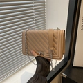 Beige quilted small crossbody bag with silver chain strap and metal twist-lock - Khaki