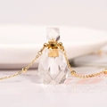 Elegant crystal perfume bottle pendant necklace with faceted clear stone and gold chain - Clear Quartz-Gold