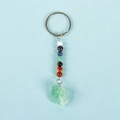 Handmade chakra energy keychain with seven colorful stones and raw green fluorite pendant - Fluorite