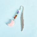Silver metal feather bookmark featuring seven chakra beads and a pink quartz moon pendant - Rose Quartz