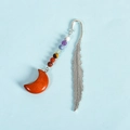 Silver metal feather bookmark with 7 chakra beads and orange crescent moon pendant - Red Jasper