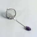 Stainless steel tea infuser featuring a natural purple crystal stone pendant decoration - Amethyst