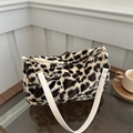 Stylish leopard print faux fur shoulder bag with white strap and gold hardware - White