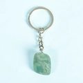 Polished translucent green natural fluorite gemstone keychain with silver metal ring - Fluorite