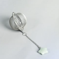 Mesh stainless steel tea infuser with chain and green star crystal pendant - Green Aventurine