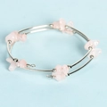 Double-layered spiral bracelet featuring natural rose quartz gravel and silver metal tubes - Rose Quartz